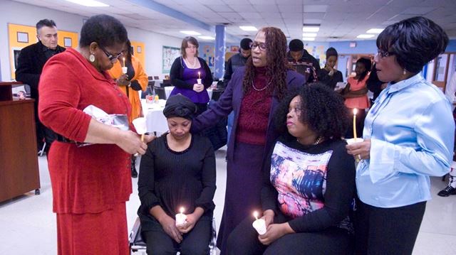 Julia Farquharson, left, Comfort Duodu, Rev. Sky Starr, Stephanie Whyte and Joan Howard participate in an inter-faith community memorial service in support of mothers of murder victims held at Monsignor Fraser College - Norfinch campus. - Staff photo/ANDREW PALAMARCHUK